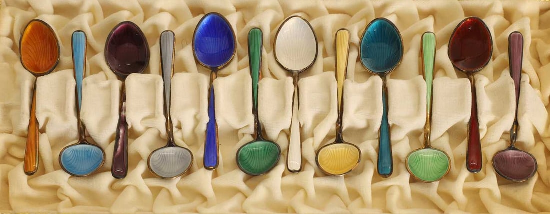 A cased set of twelve enamelled teaspoons, - 2