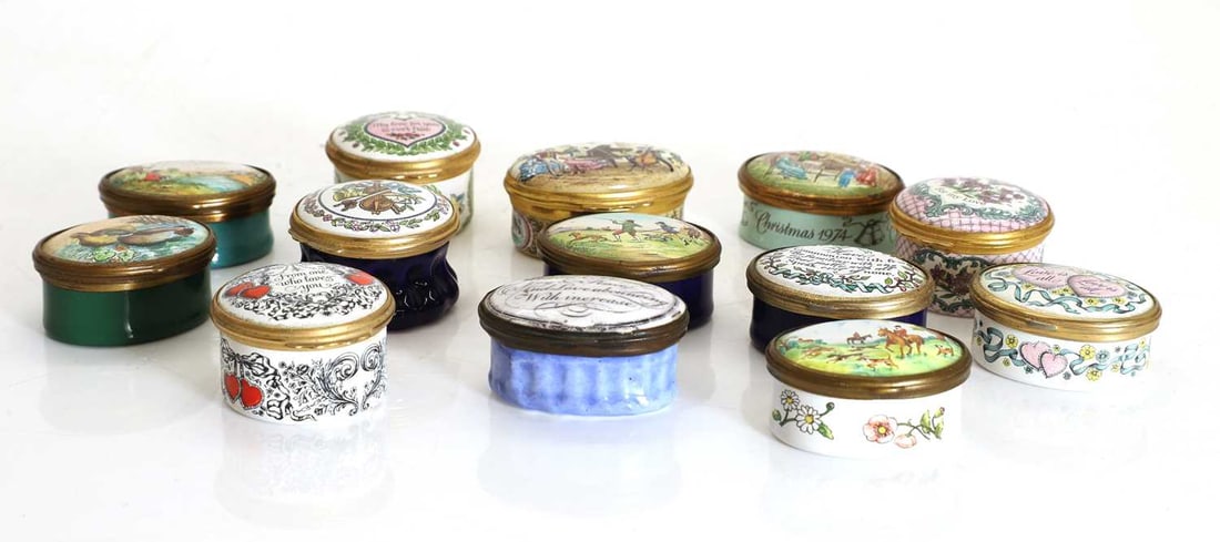 A collection of enamelled pill boxes, - 2