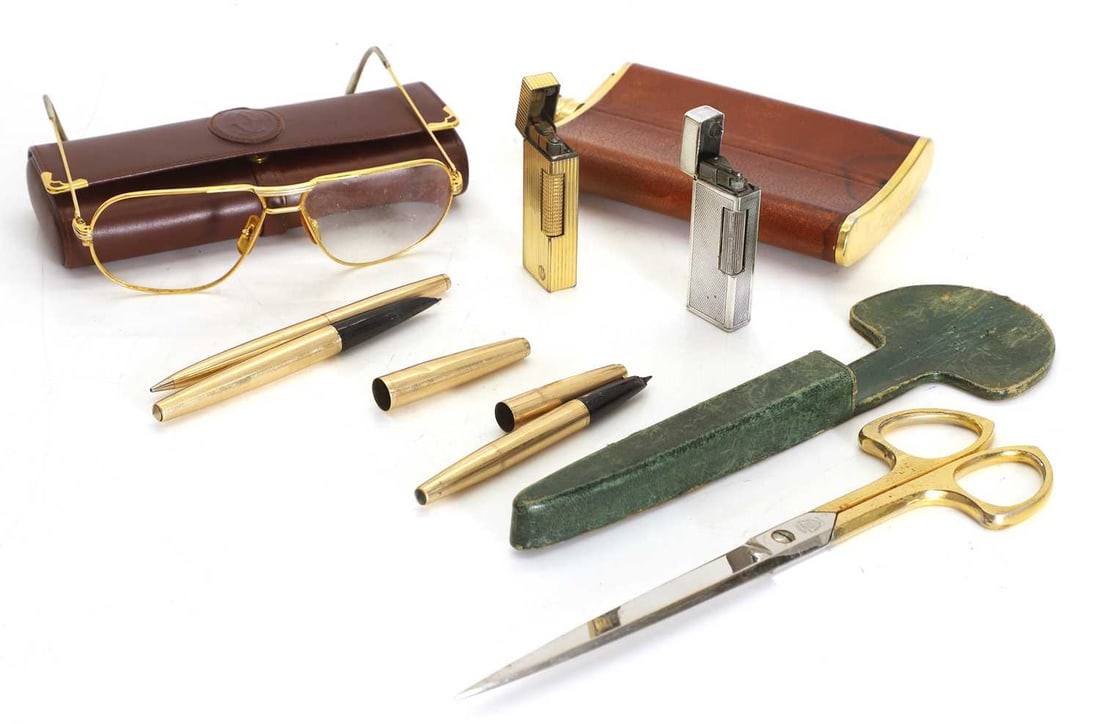Three gold-plated Parker pens, - 2