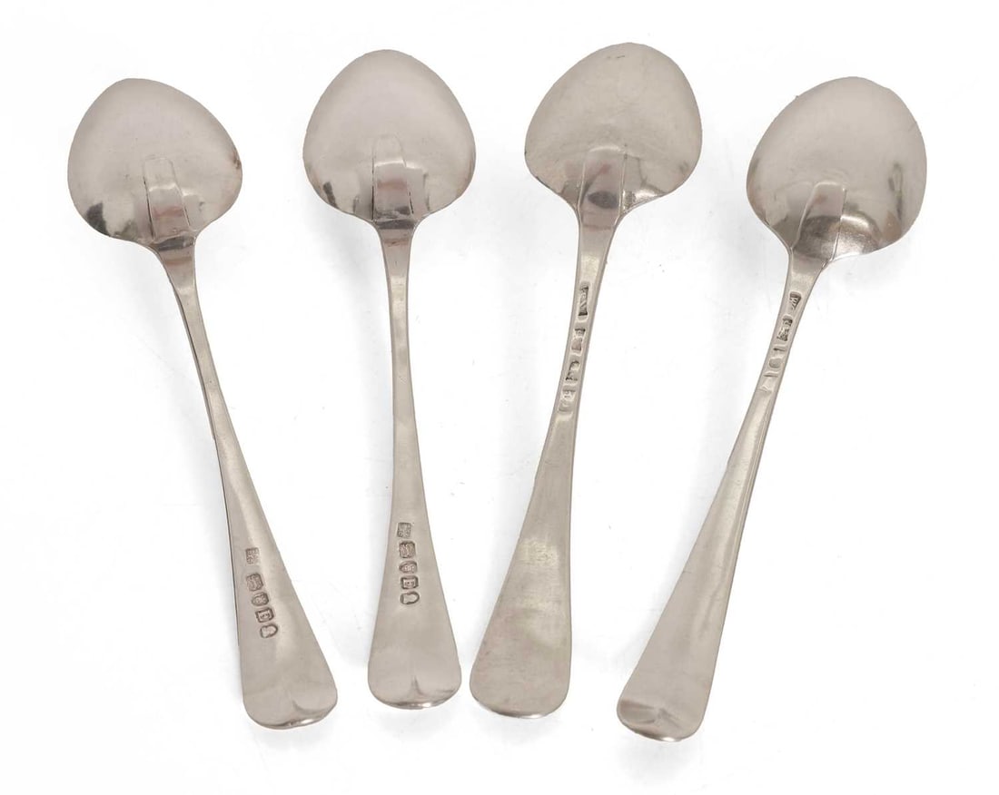 A collection of four silver spoons, - 2