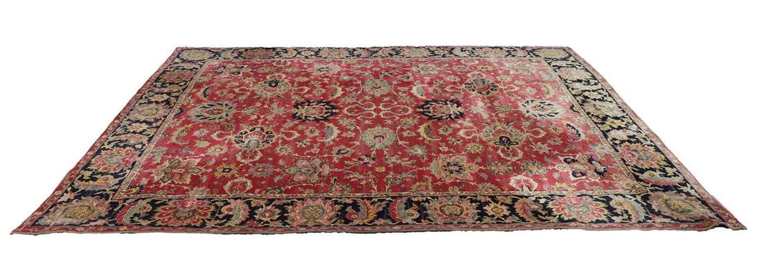 A large pink ground carpet, 20th century,: A large pink ground carpet, 20th century, with bold scrolling foliate Shah Abbasi motifs 310 x 416cm