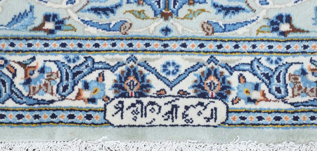 A signed central Persian Kashan carpet, - 2