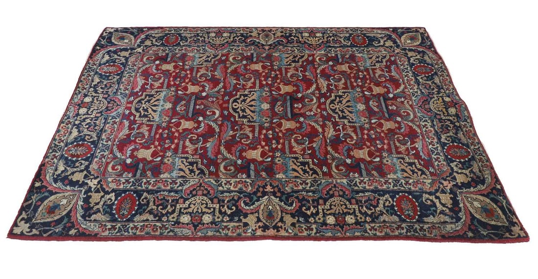 A pair of red ground Kashan rugs, 20th century, - 2