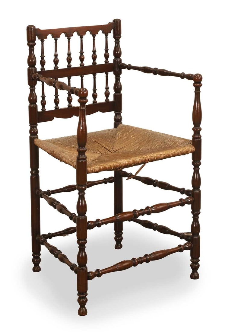 A finely turned armchair, 19th century,: A finely turned armchair, 19th century, with rush seat and bobbin turned details 58cm wide, 46cm deep, 87cm high Provenance: The contents of Thornton House, Clare. Condition Report: Light knocks and