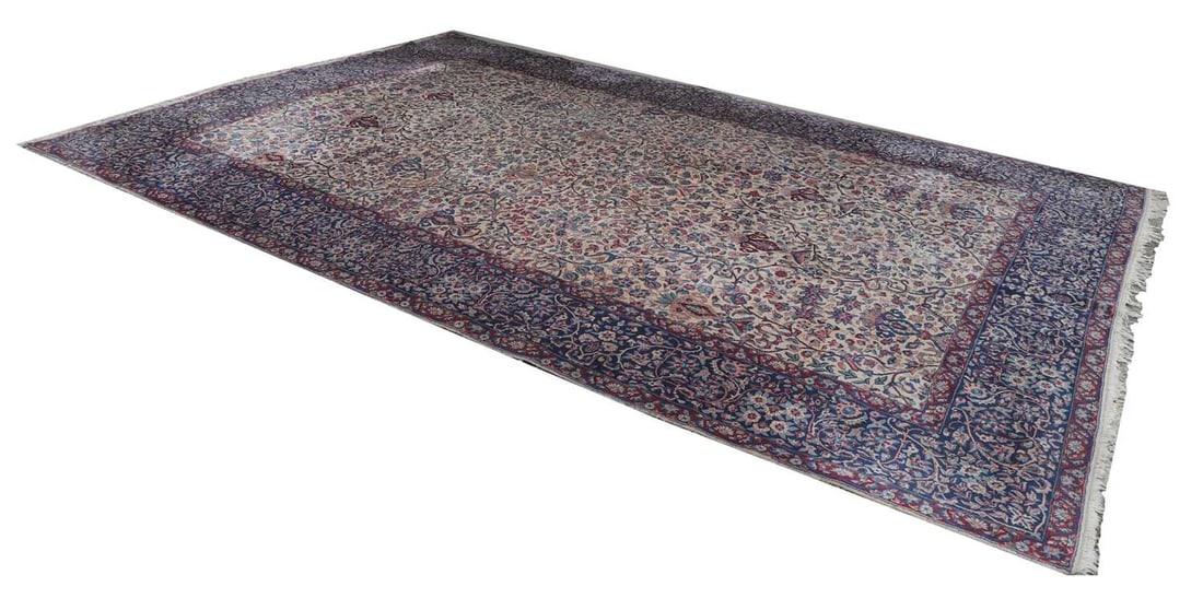 A Persian wool carpet, 20th century, (1 of 2)