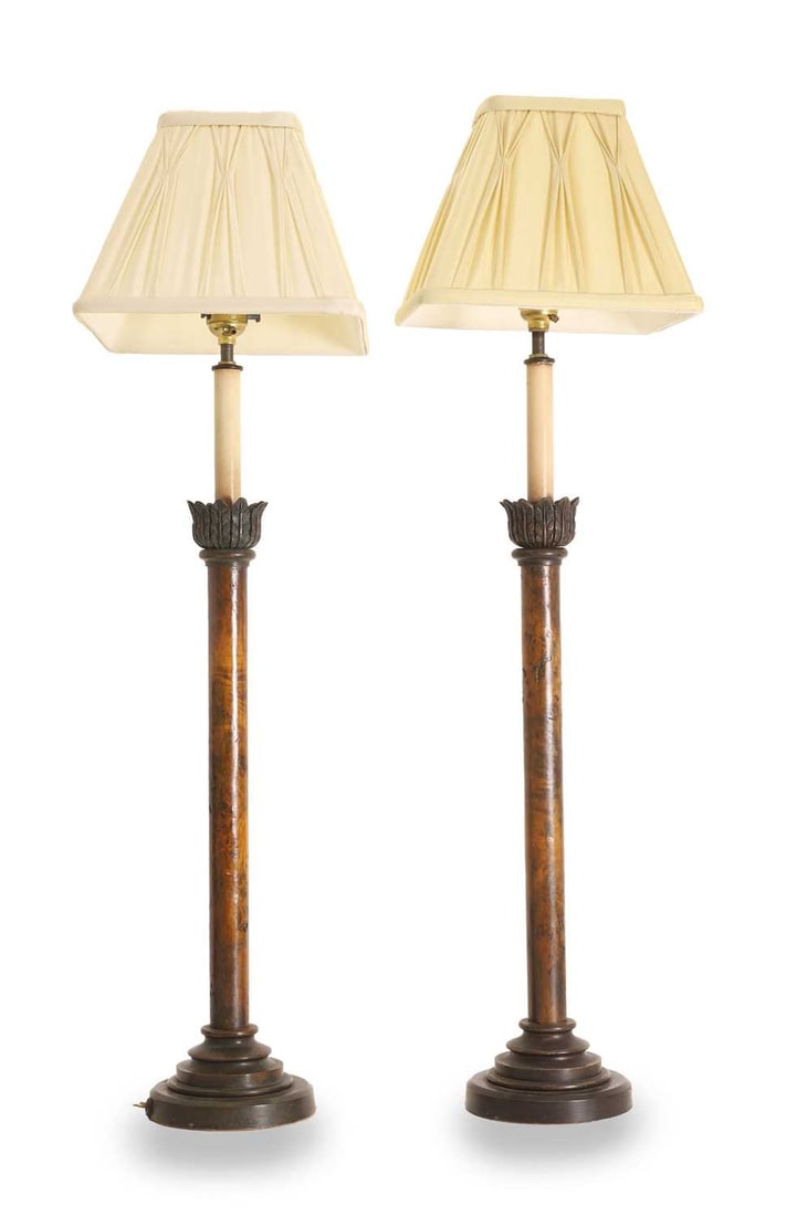 A pair of bronze table lamps, 20th century,: A pair of bronze table lamps, 20th century, with stepped circular bases, and palm leaf collars 59cm high 2 Provenance: The contents of Thornton House, Clare. Condition Report: We cannot guarantee the