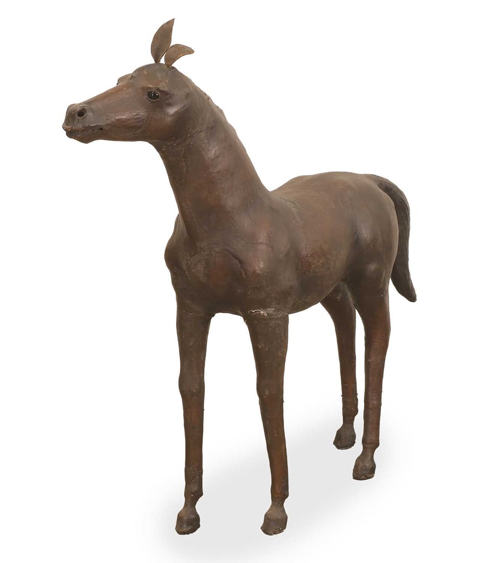 A Liberty-style leather horse, 20th century - 2