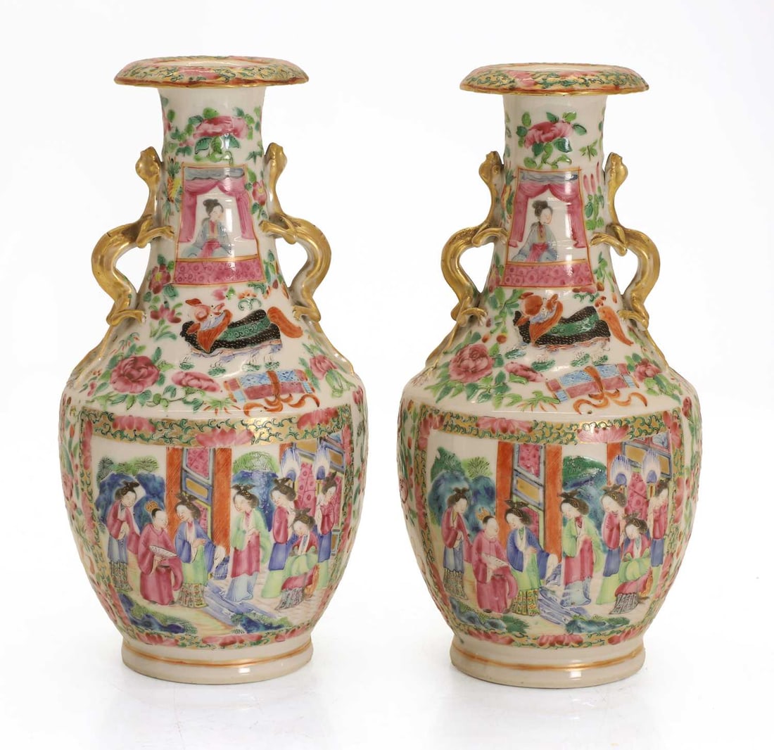 A pair of Canton porcelain vases, late 19th century,: A pair of Canton porcelain vases, late 19th century, with panels of figures, flowers and emblems, with dragon mounts to the necks 2 Condition Report: Gilt wear and rubbing.