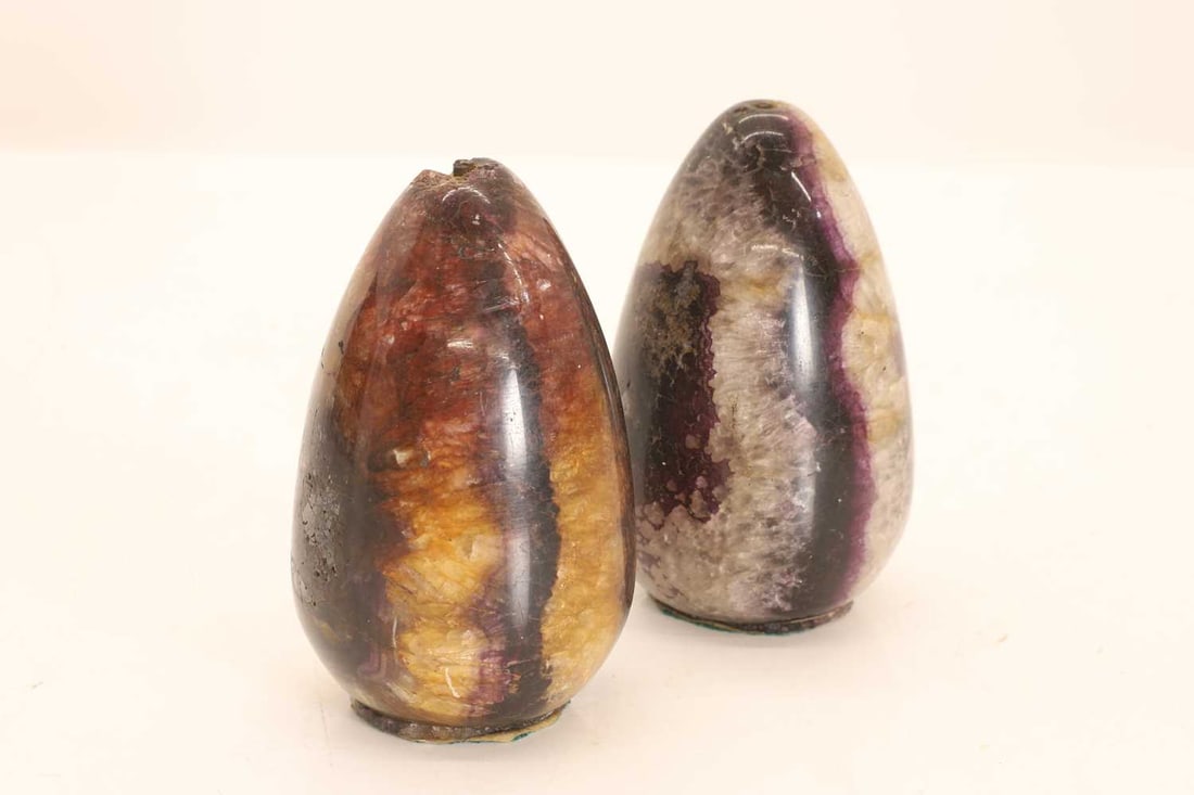 Two Blue John paperweights, 19th century, - 2