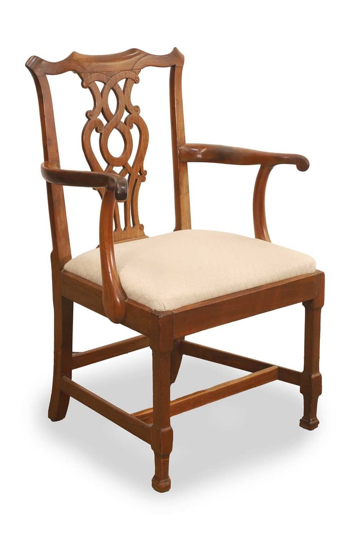A George III style mahogany armchair, 19th century,: A George III style mahogany armchair, 19th century, with pierced and carved splat over a drop in seat, raised on square tapering legs with blocked stretcher terminals 68cm wide, 54cm deep, 100cm high