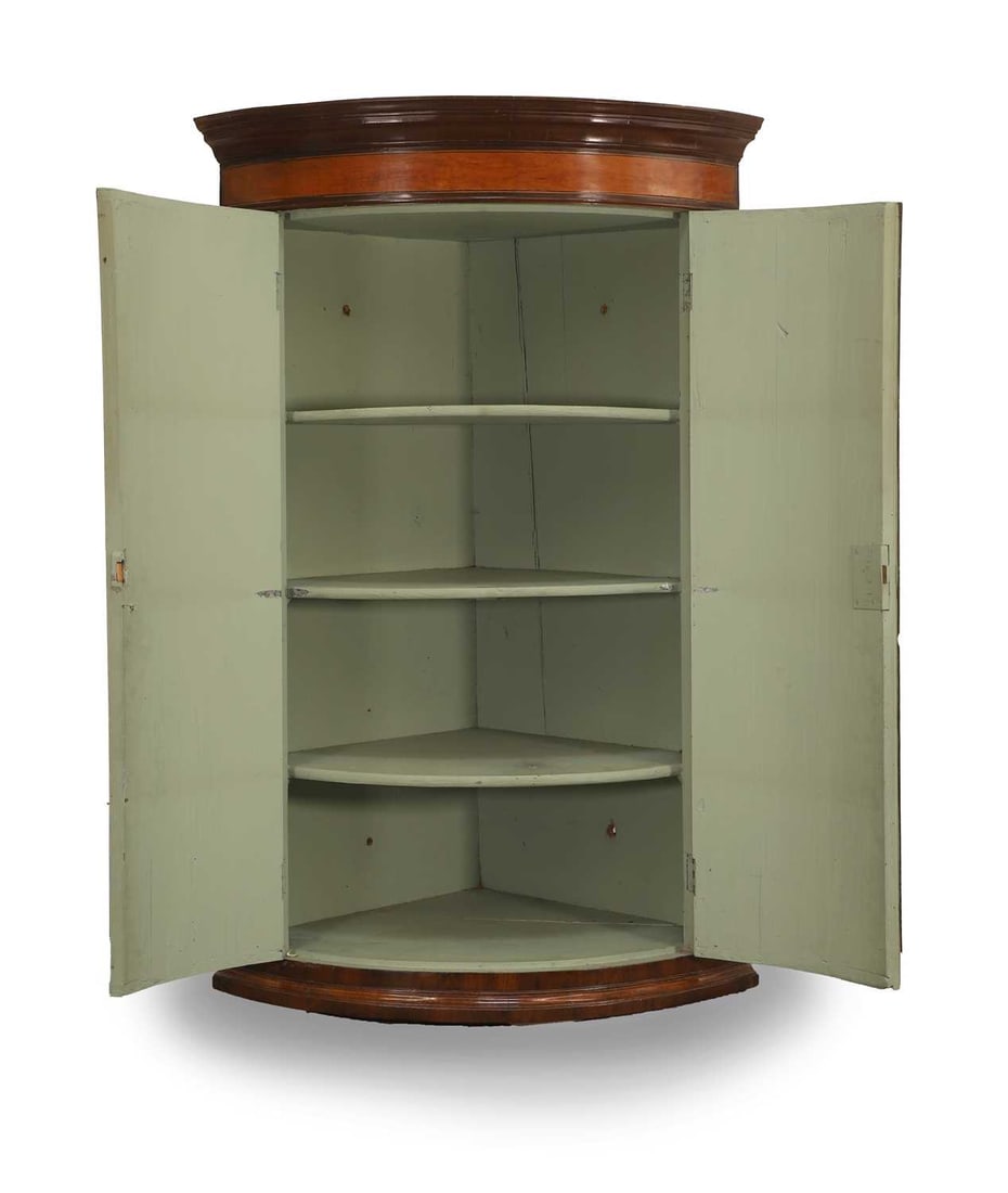 A George III mahogany ‘plum pudding’ and satinwood crossbanded corner cupboard, mid to l - 2