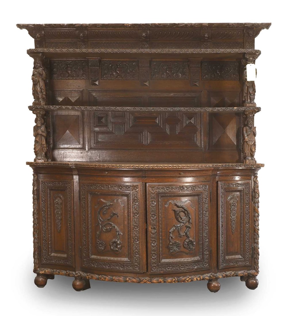 A Renaissance-style carved oak and beech dresser, 19th century, but possibly incorporating some earl: A Renaissance-style carved oak and beech dresser, 19th century, but possibly incorporating some earlier elements, Continental, with all-over carved decoration, with lion masks, figures and floral