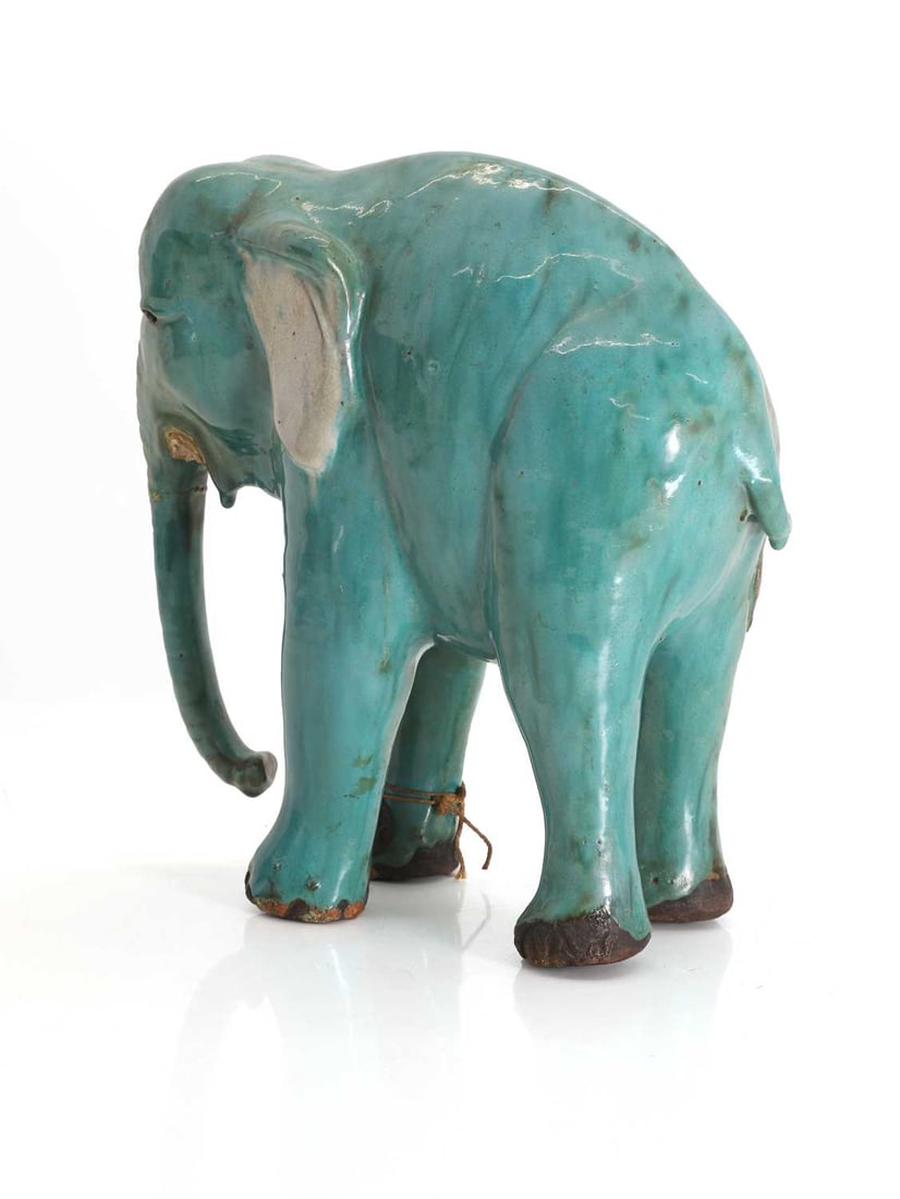 A Chinese style porcelain elephant, 20th century, - 2