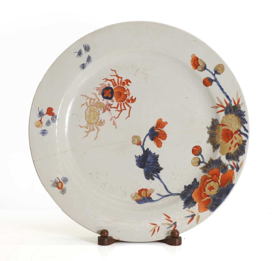 A large Chinese Imari porcelain charger, 18th century,: A large Chinese Imari porcelain charger, 18th century, decorated with flowering peonies and crabs, with stand dish, 39cm diameter Provenance: The contents of Thornton House, Clare. Condition Report: