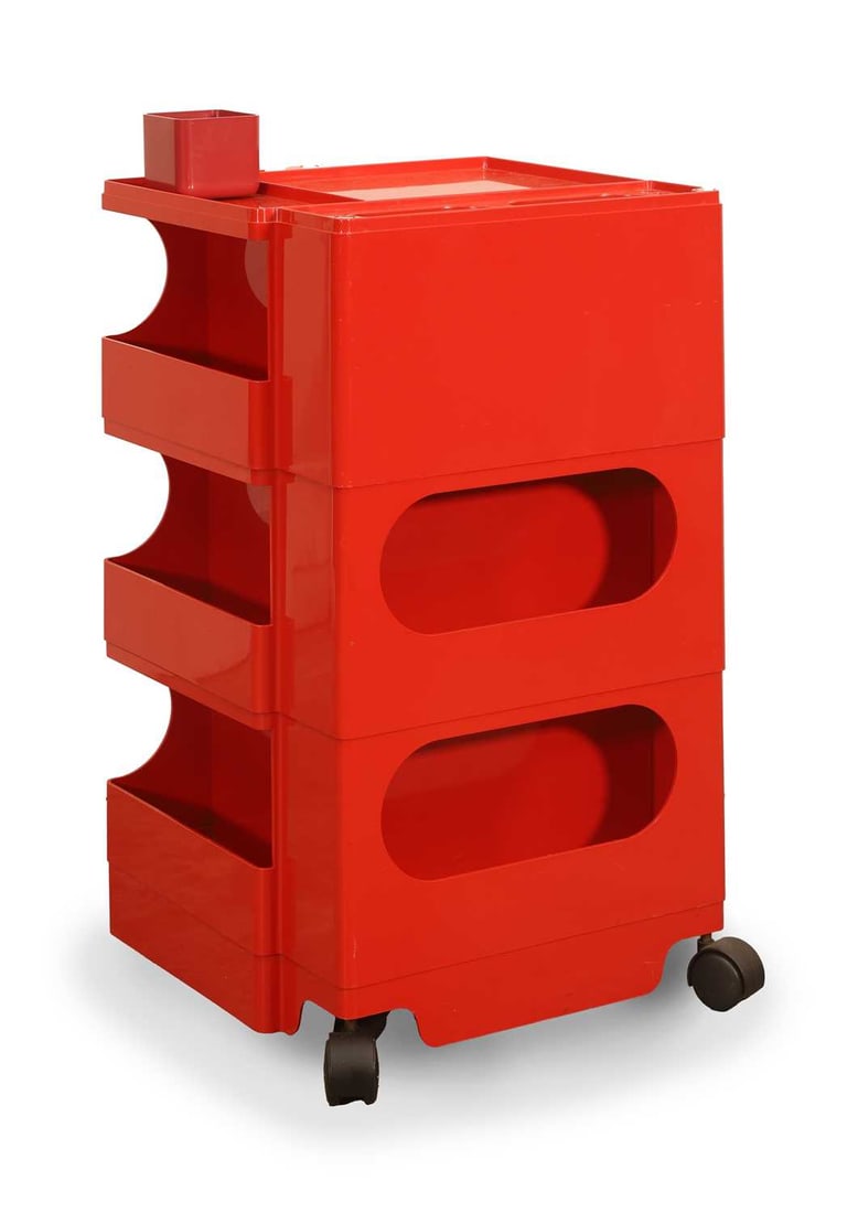 Cesare 'Joe' Colombo (Italian, 1930-1971) a red plastic 'Boby' cabinet,: Cesare 'Joe' Colombo (Italian, 1930-1971) a red plastic 'Boby' cabinet, moulded marks to the underside, with facsimile signature to the lower tray, on castors 43.5cm wide, 40.5cm deep, 73.5cm high