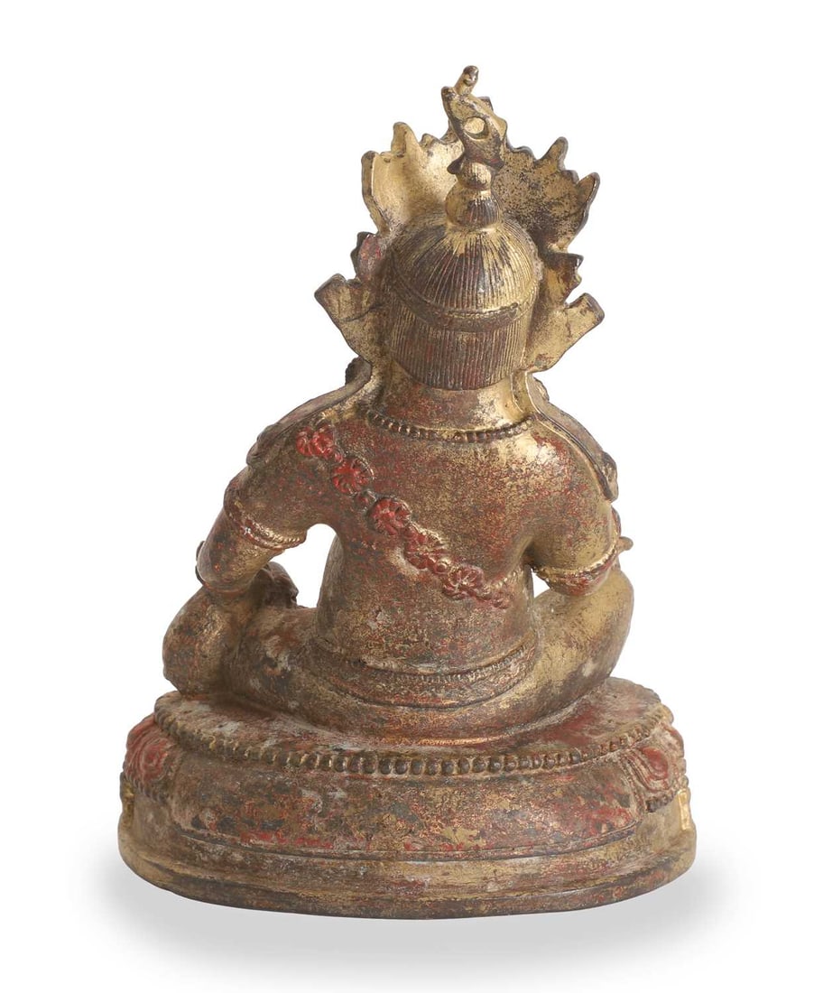 A Tibetan polychrome painted cast-metal figure of Jambhala, - 2