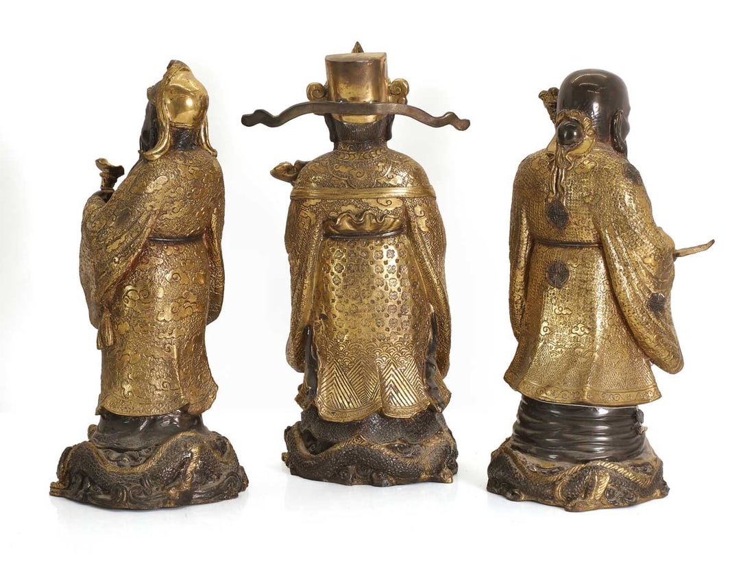 Three Chinese gilt-brass figures of of 'Lu', 'Fu' and 'Shou', early 20th century, - 2