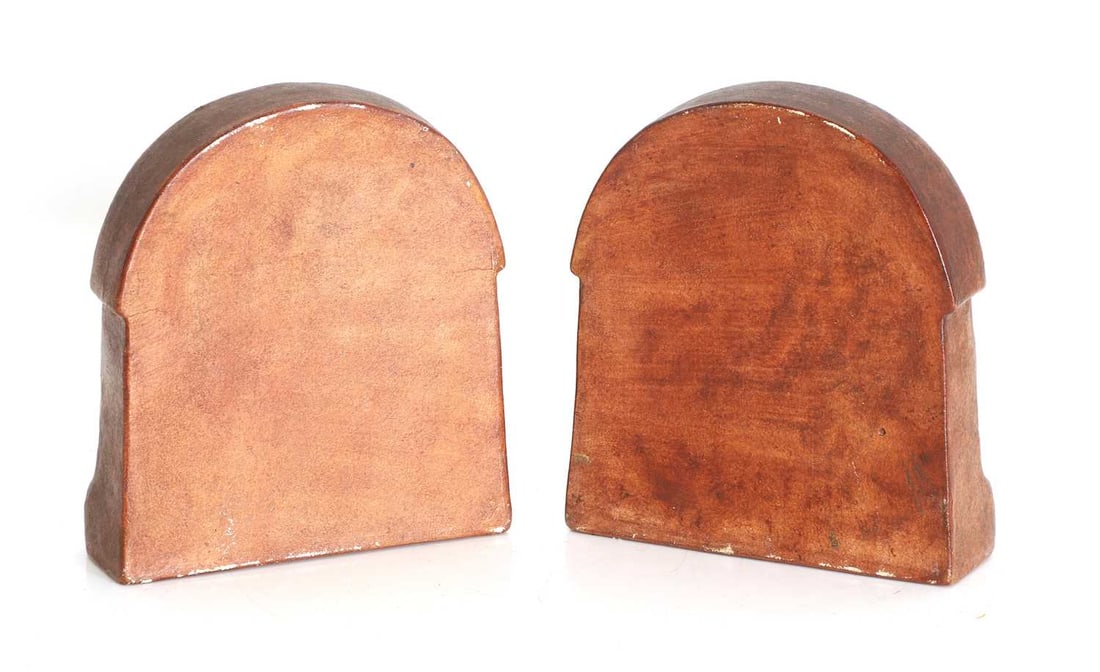 A pair of Compton Art Potters' Guild Compton Pottery bookends, 20th century, - 2