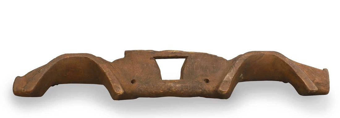 A decoratively carved yoke, 19th century, - 2