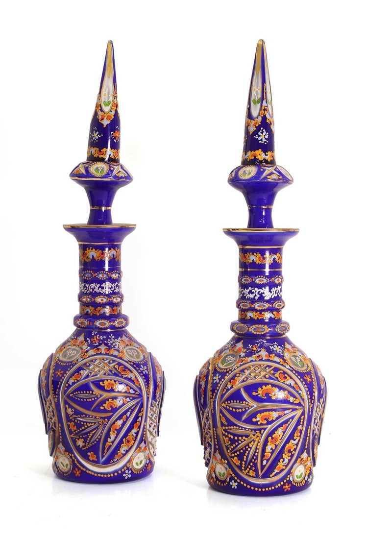 A pair of Bohemian, for the Ottoman market, blue glass decanters, 20th century, - 2