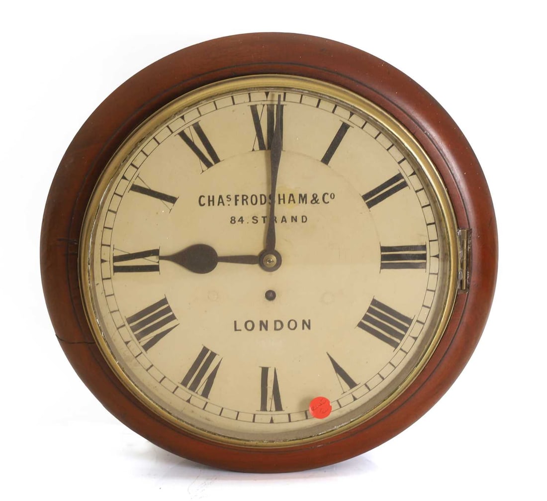 A mahogany wall clock, late 19th century/ early 20th century, (1 of 2)