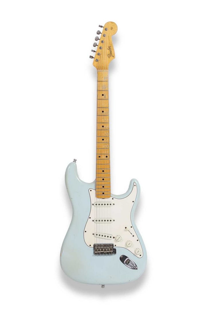 A Fender Custom Shop ‘Journeyman’ Stratocaster electric guitar,: A Fender Custom Shop ‘Journeyman’ Stratocaster electric guitar, serial number 0804, the double cutaway body with sonic blue finish, aged white pickguard and pickups, complete with certific
