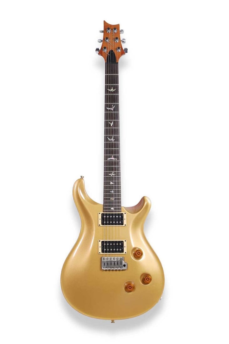 A 2002 Paul Reed Smith PRS 'Goldtop' Custom electric guitar,: A 2002 Paul Reed Smith PRS 'Goldtop' Custom electric guitar, serial number 2 ****6, the double cutaway body with metallic gold finish, complete with hardcase