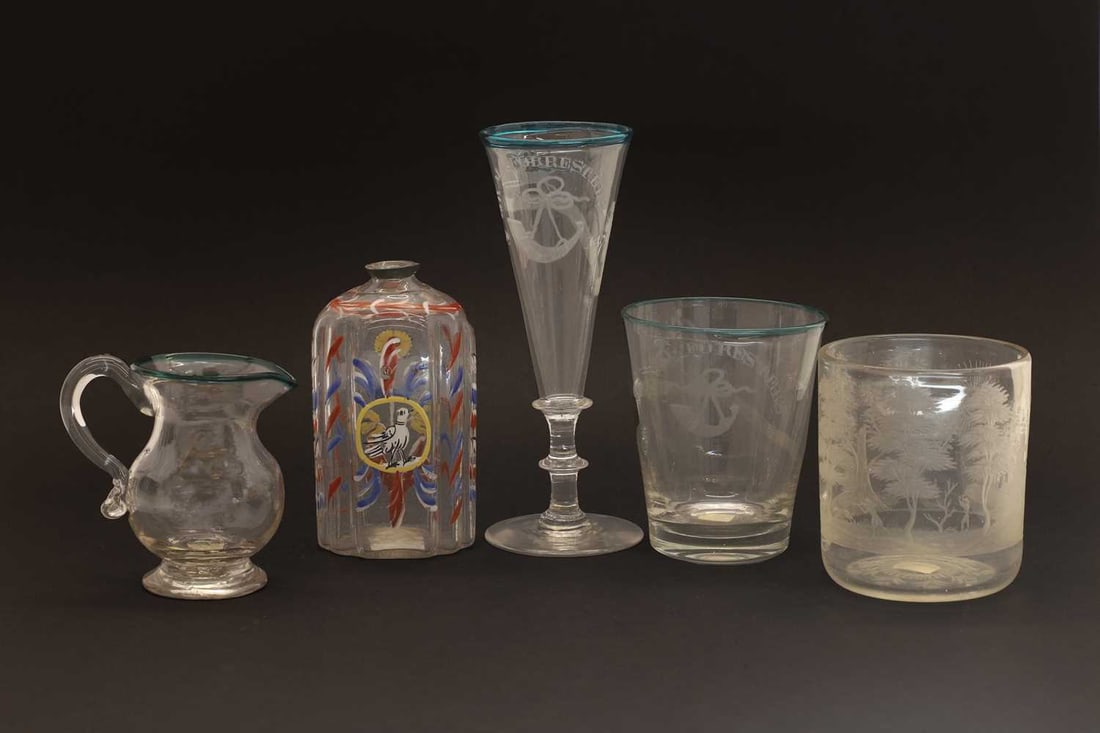 A collection of table glass, late 18th century and later,: A collection of table glass, late 18th century and later, comprising an ale flute and tumbler, engraved 'Forresters No 147' and 'Royal Foresters' respectively, each with an applied green lip, a simila