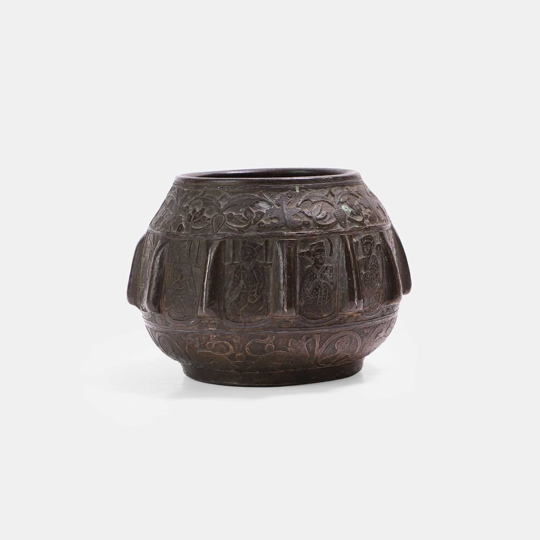 A Qajar bronze medicinal mortar, 19th century,: A Qajar bronze medicinal mortar, 19th century, the exterior with repeating elongated lobes in relief with alternating panels of stylised figures, between bands of foliage, animals and figures in