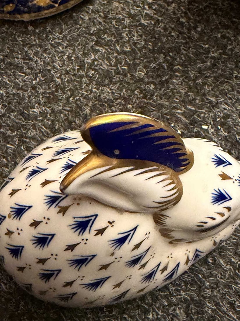 A collection of eleven Royal Crown Derby porcelain paperweights, - 11