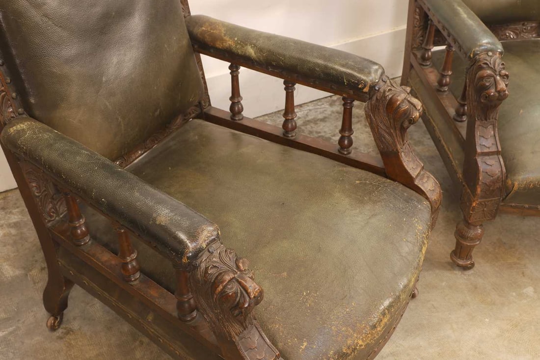 A pair of Victorian carved oak and leather armchairs, 19th century, - 2