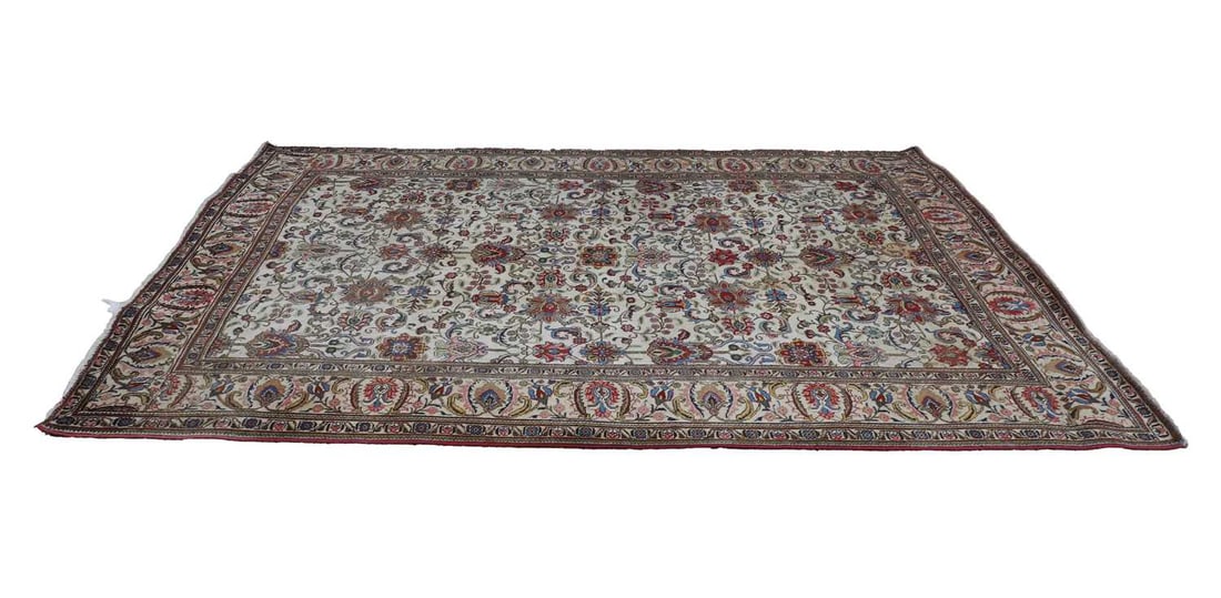 A cream ground carpet, Persian, 20th century,: A cream ground carpet, Persian, 20th century, with dense floral motifs 258cm x 358cm Provenance: The contents of Thornton House, Clare.