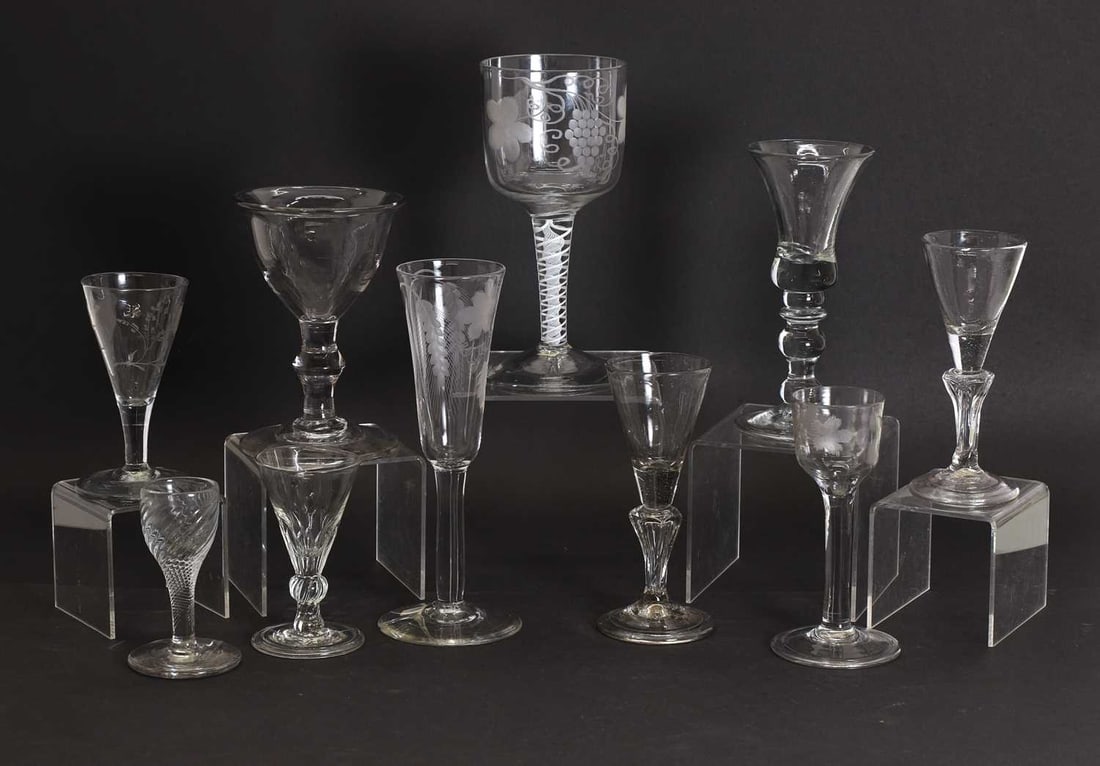 A collection of glass tableware, 18th century,: A collection of glass tableware, 18th century, comprising a baluster wine glass, circa 1730, with a bell bowl, an inverted baluster stem and a folded conical foot, a sweetmeat glass, circa 1740, with