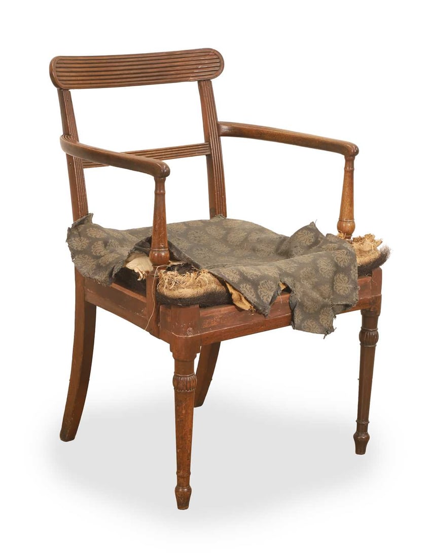 A George III mahogany chair, circa 1770: A George III mahogany chair, circa 1770 with fluted top rail, bar and arms, above a horsehair seat, on tapering supports 53cm wide, 55cm deep, 85cm high, seat 43cm Condition Report: In need of