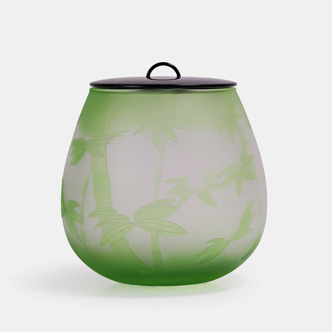 A Japanese glass mizusashi and cover, 20th century,: A Japanese glass mizusashi and cover, 20th century, by Haruhiko Niikura (Japanese, b.1954), of ovoid form, decorated with bamboo, blown and acid-etched glass, signed Haruhiko, cover lacquered, wood