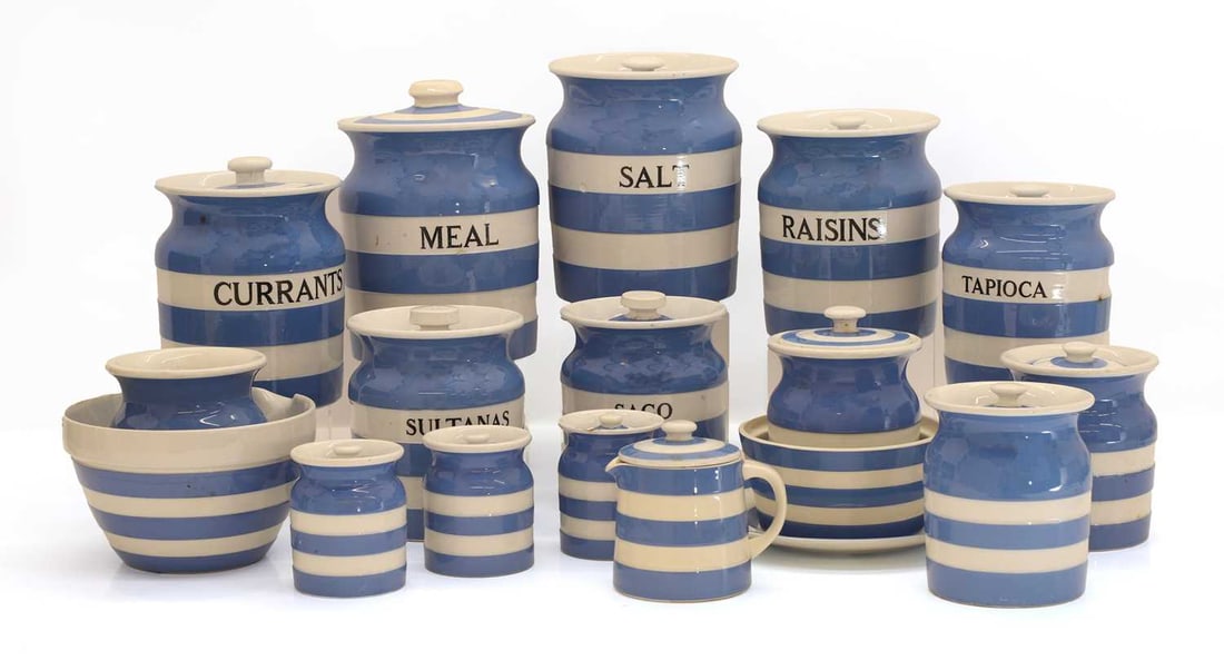 An extensive set of T G Green Cornish ware items, of modern manufacture,: An extensive set of T G Green Cornish ware items, of modern manufacture, to include storage jars labelled 'SALT', 'MEAL', 'SAGO', 'SULTANAS', etc, a mixing bowl, a jug, and a Cornish Kitchen plate Lar