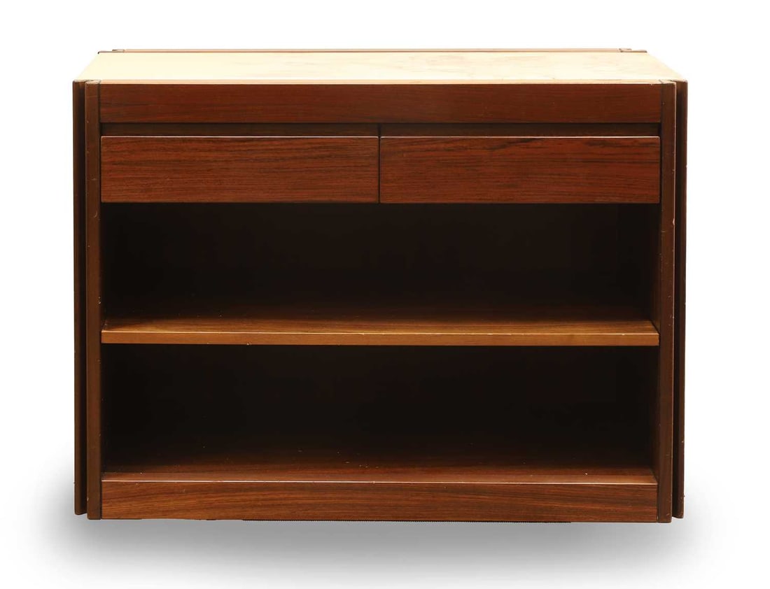 A Molteni cabinet, designed by Angelo Mangiarotti: A Molteni cabinet, designed by Angelo Mangiarotti with a marble inset panel, the front fitted with two drawers and a shelf, on ball castors 95.5cm wide, 48cm deep, 73cm high Condition Report: Some fin