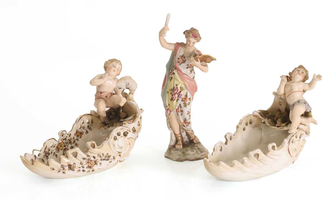 A pair of Continental porcelain salts, (1 of 2)