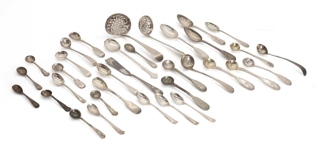 A collection of silver flatware,: A collection of silver flatware, to include a George III silver sugar sifter, by Samuel Godbehere, Edward Wigan & James Boult, London 1807,one other similar and a quantity of silver salt spoons