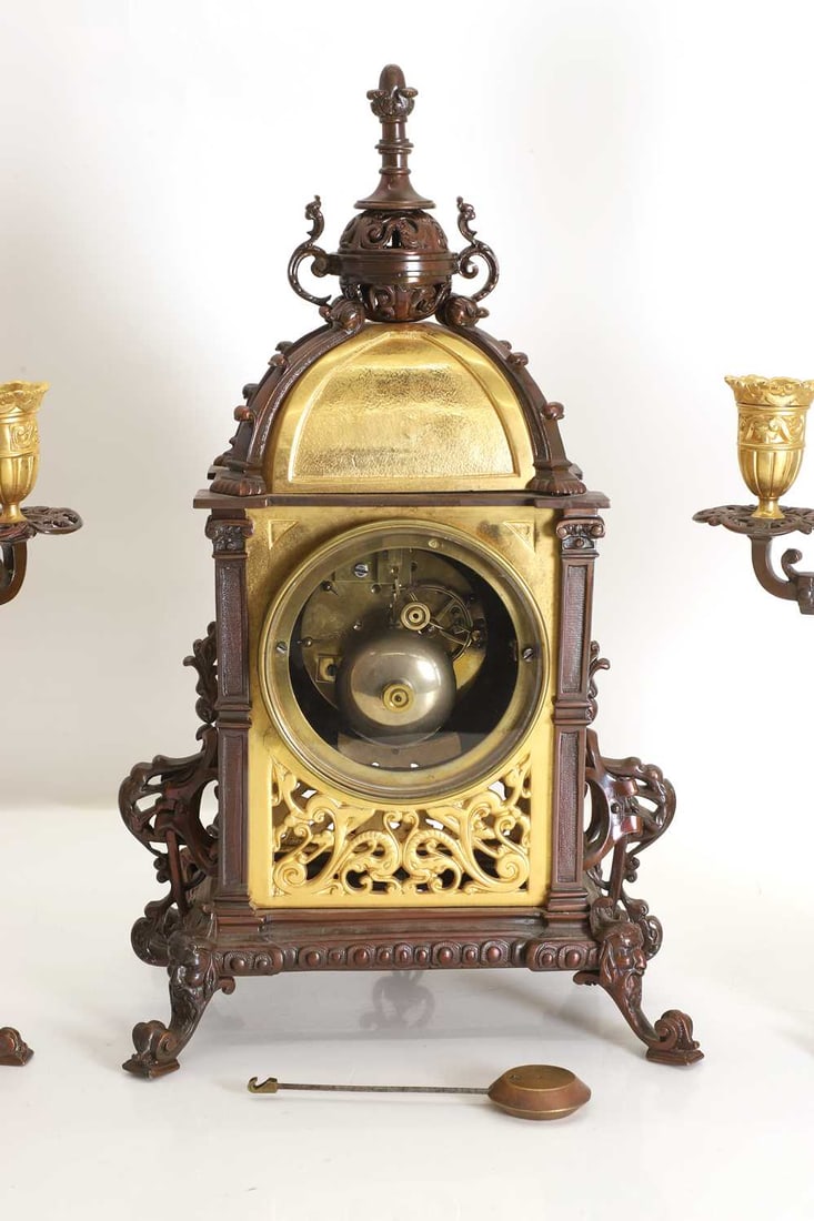 A French gilt metal and bronze clock garniture, 20th century, - 2