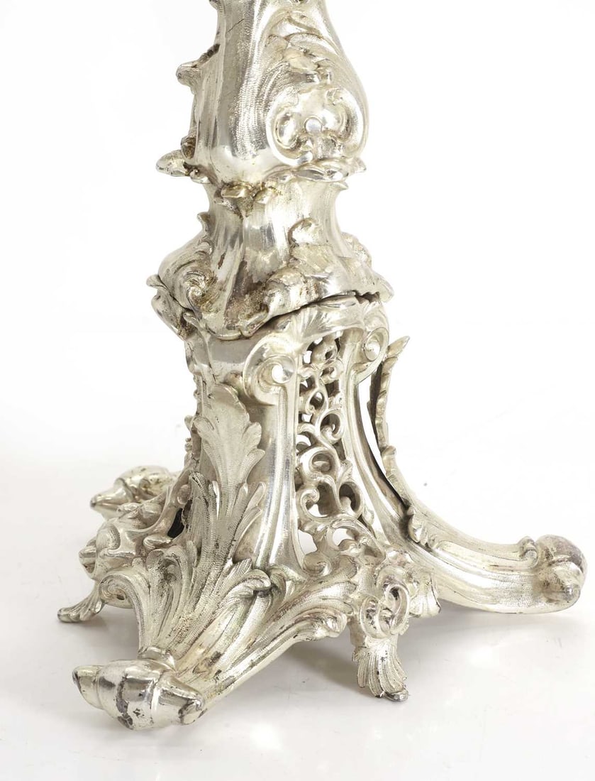 A silver-plated and white metal candelabra, - 2