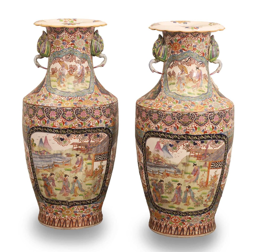 A pair of large porcelain baluster vases, 20th century, Chinese,: A pair of large porcelain baluster vases, 20th century, Chinese, each with a wavy rim, and handles modelled as cranes, profusley decorated with birds, scenes, and floral arrangements 45cm wide 93cm