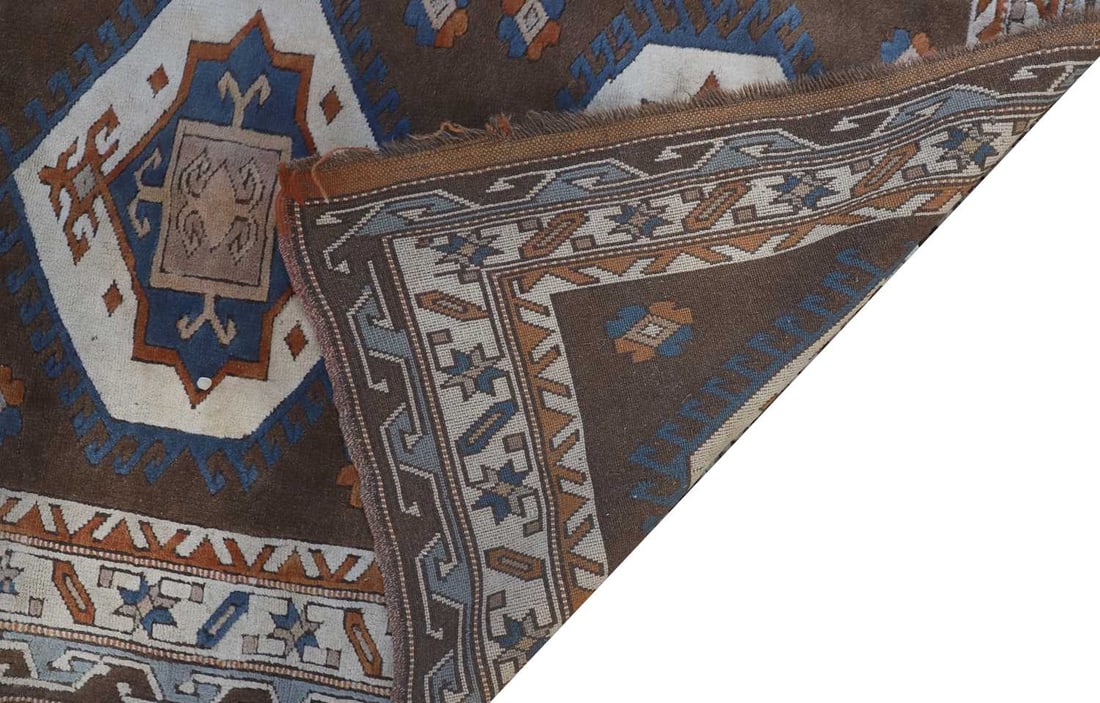 An Anatolian tribal wool rug, mid 20th century, - 2