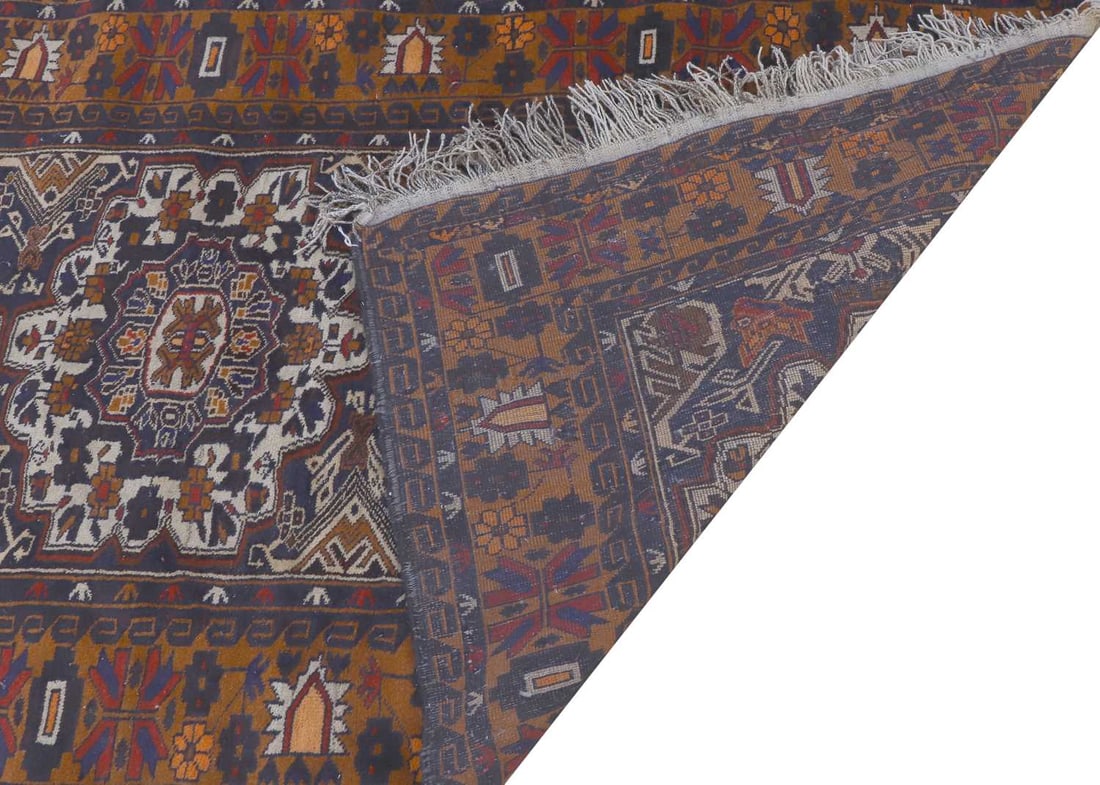 An Afghan wool rug, - 2