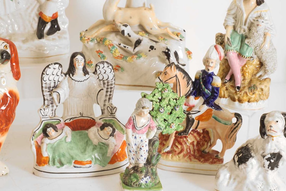 A collection of nine Staffordshire and Prattware figures, 19th century, - 2