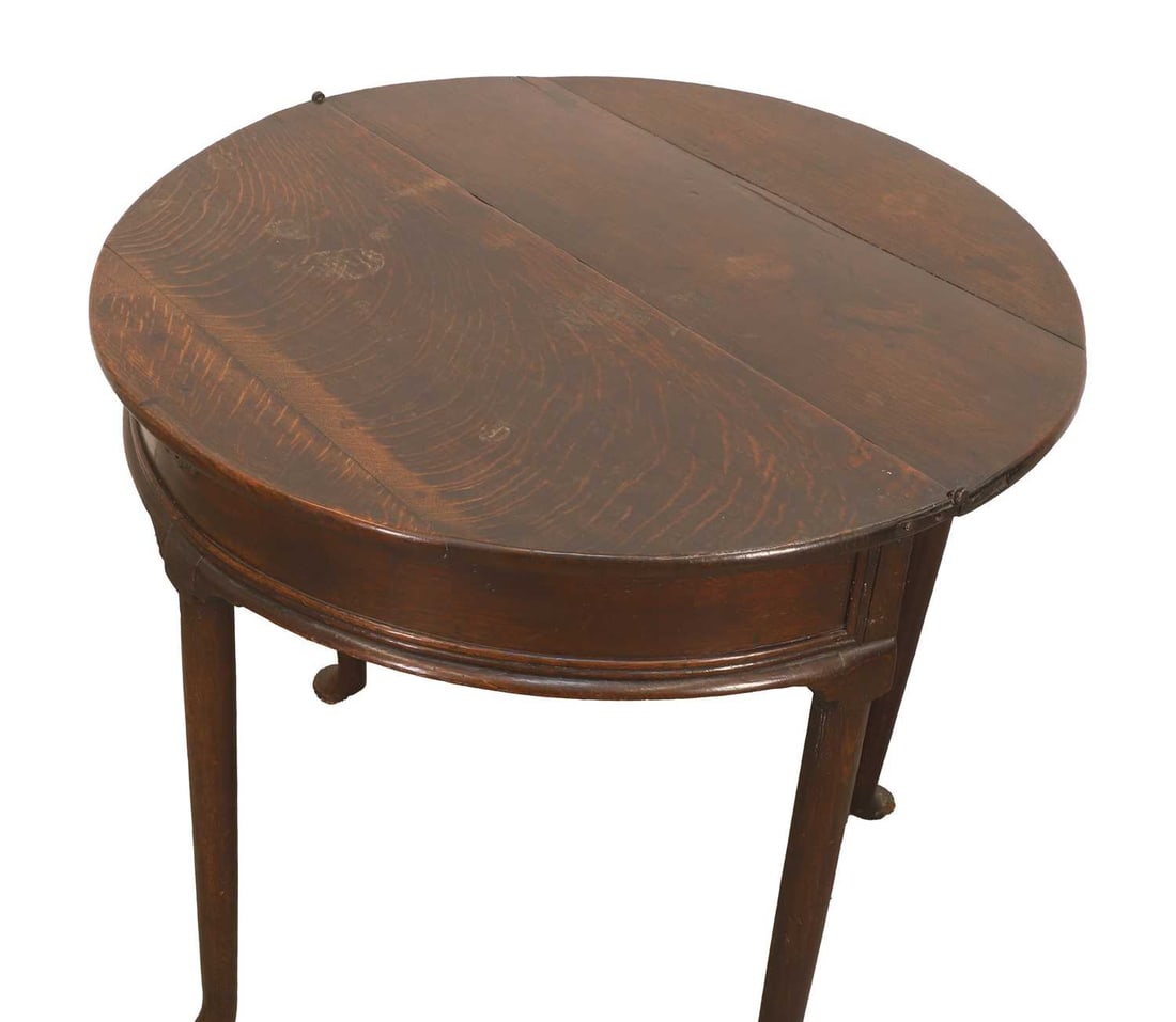 A George II oak games table, 18th century, - 2