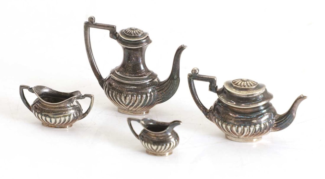 A miniature silver four piece tea service, by A Chick & Sons Ltd., London, 1972, - 2