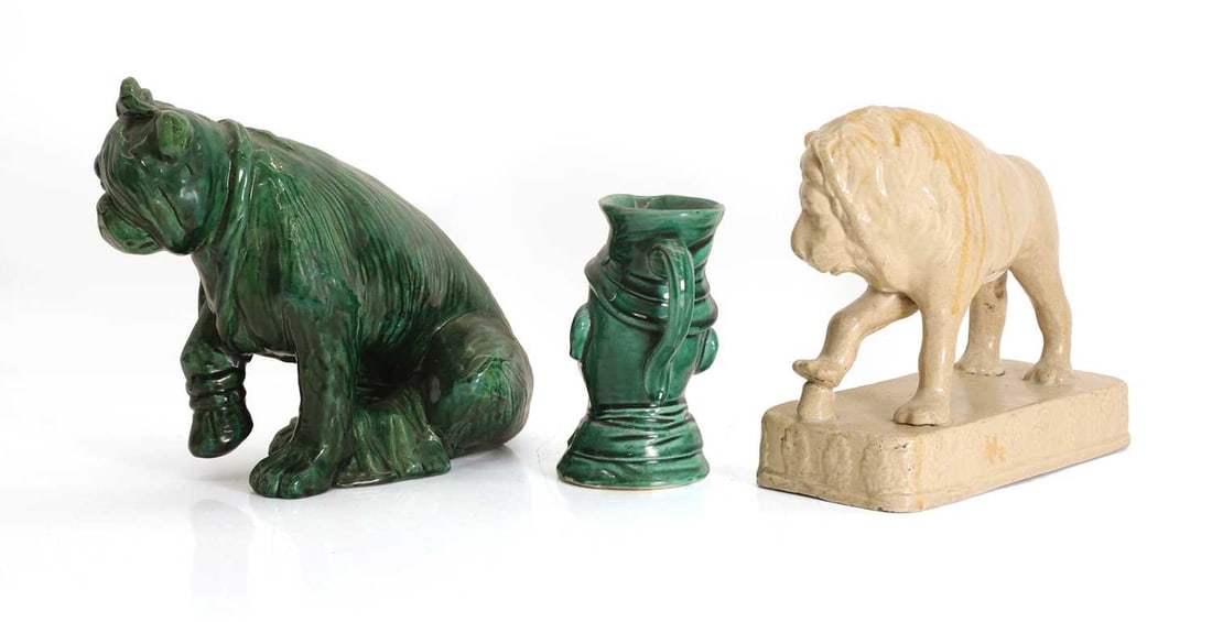 A glazed model of a lion, late 19th century, - 2