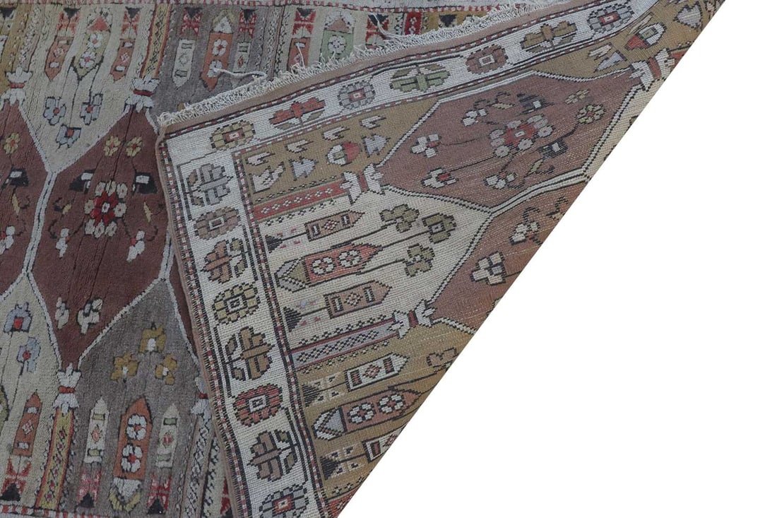 A Turkish wool rug, - 2