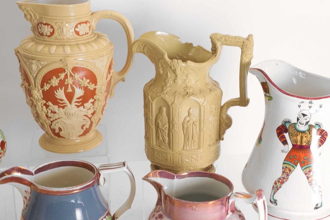 A collection of pottery and stoneware jugs, 19th century and later, - 2
